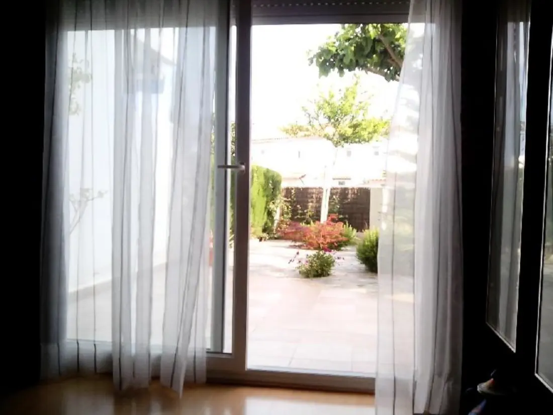 Résidence Wohnung mit privatem Garten am Strand